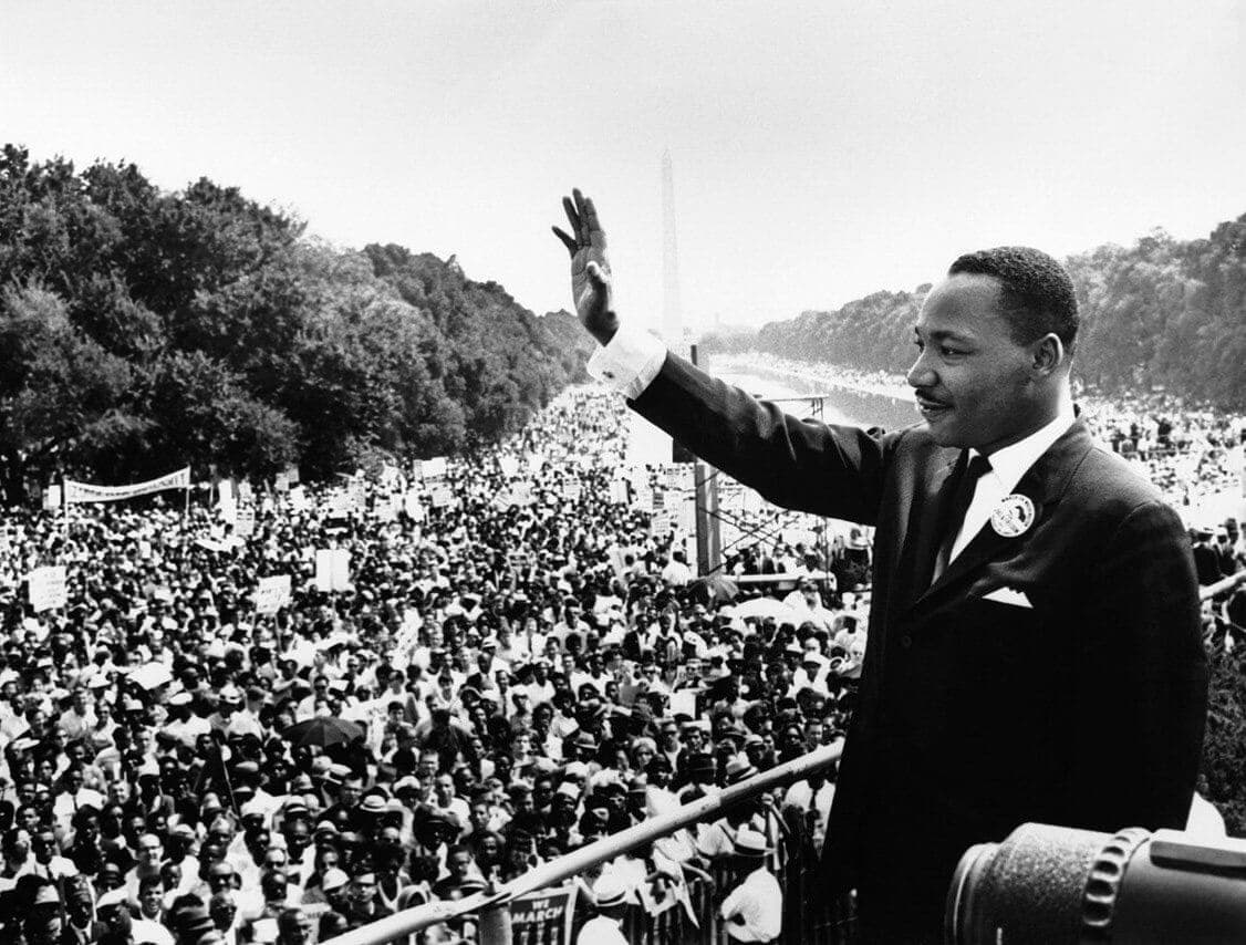 Martin Luther King, Jr. waves to protesters from the Lincoln Memorial. Martin Luther King, Jr. waves to protesters from the Lincoln Memorial.