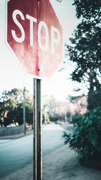 Photo of a STOP signal on a street without traffic