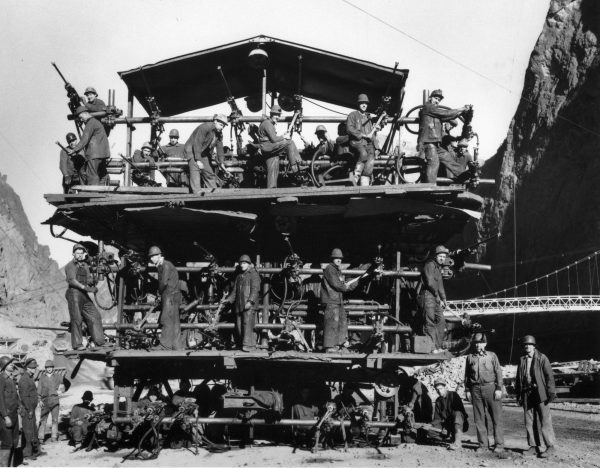 Men aboard the ‘Jumbo’ which was used for drilling the tunnels of Hoover Dam