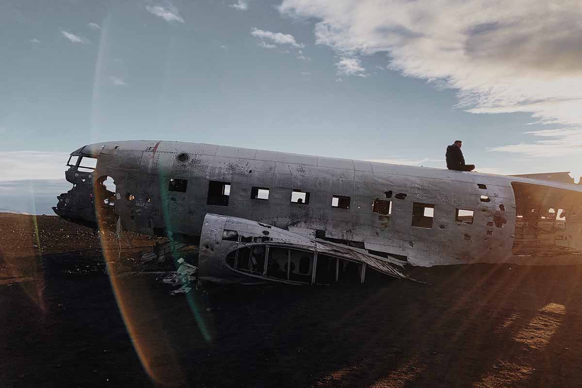 Person sitting on the Sólheimasandur plane